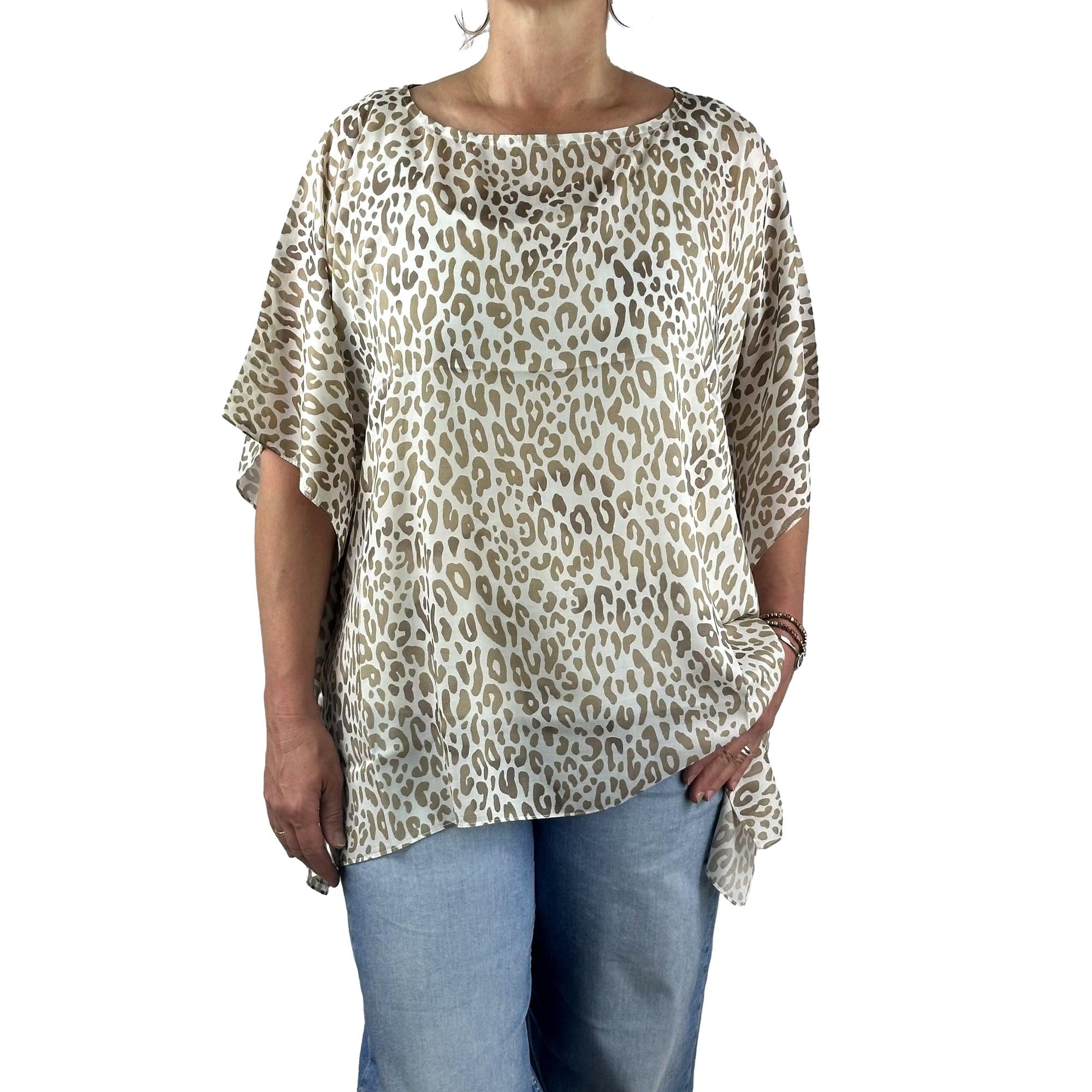 Poncho mit Leomuster. Mode von Monari. Seidel Moden Onlineshop