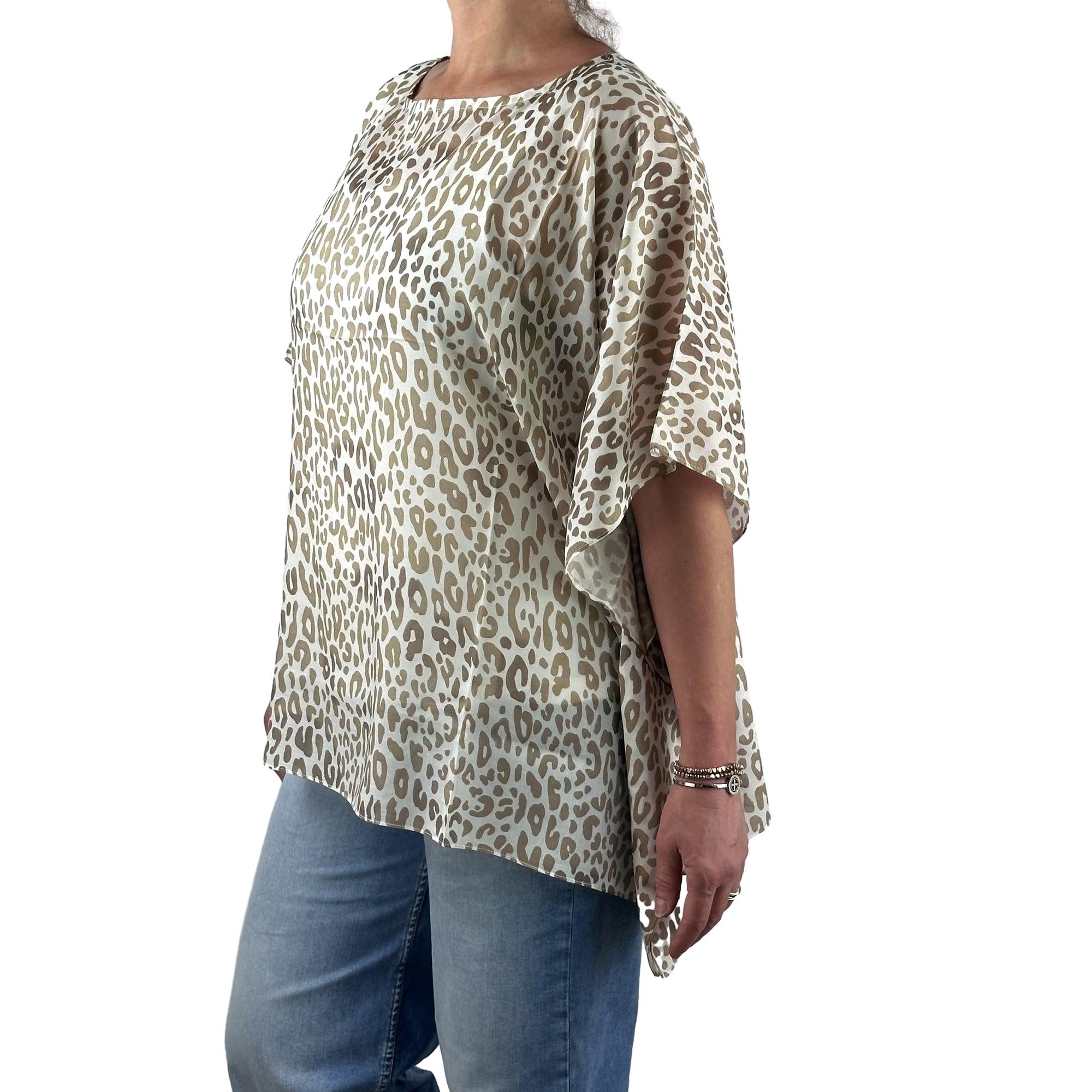 Poncho mit Leomuster. Mode von Monari. Seidel Moden Onlineshop