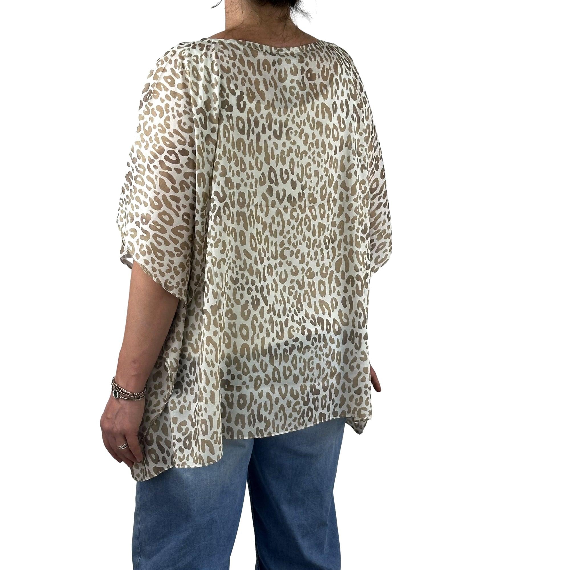Poncho mit Leomuster. Mode von Monari. Seidel Moden Onlineshop