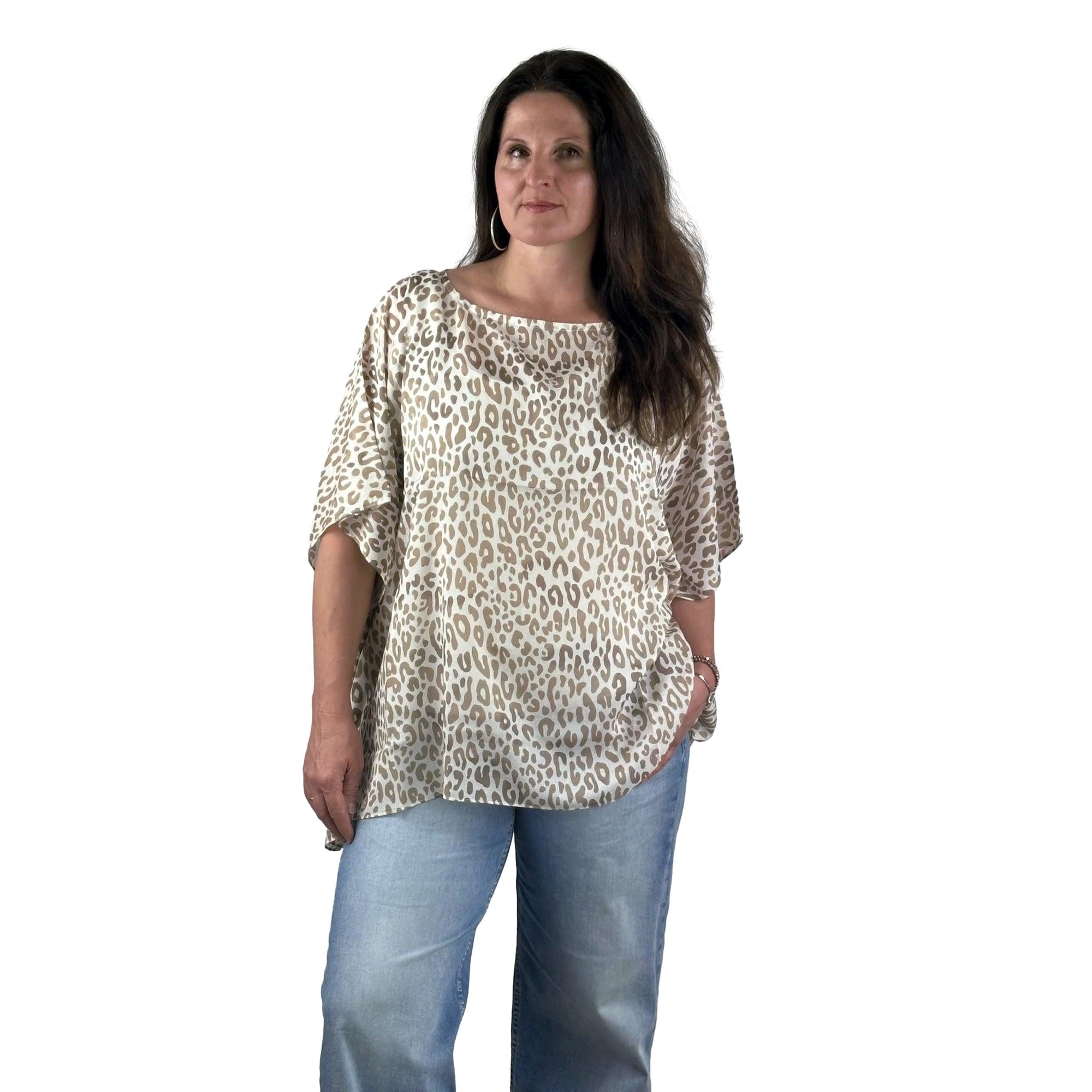 Poncho mit Leomuster. Mode von Monari. Seidel Moden Onlineshop